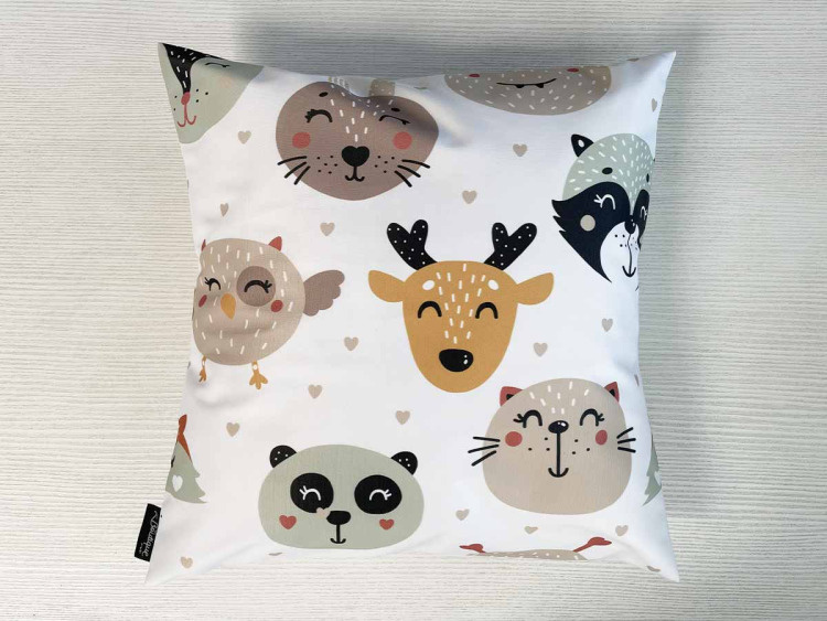 Coussin motifs animaux roses