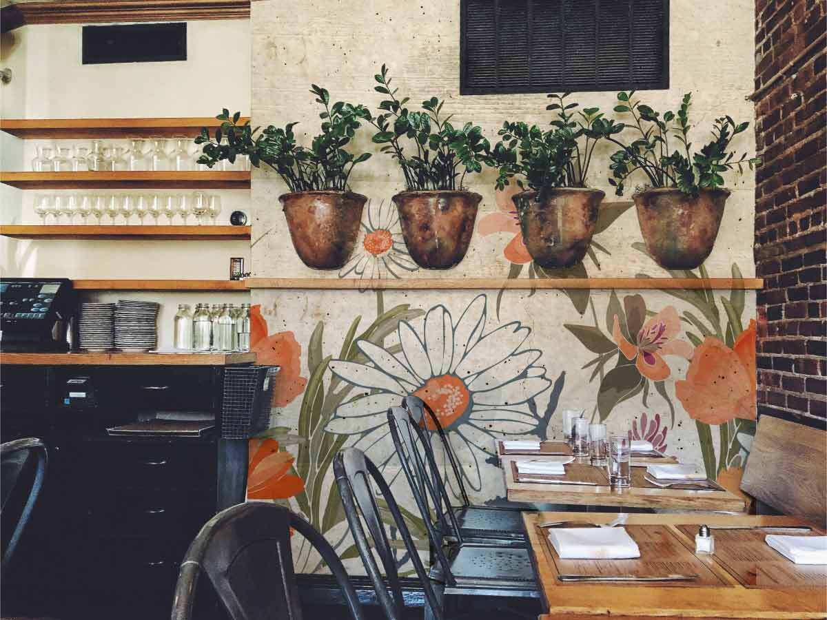 restaurant avec papier peint panoramique marguerite sur effet beton